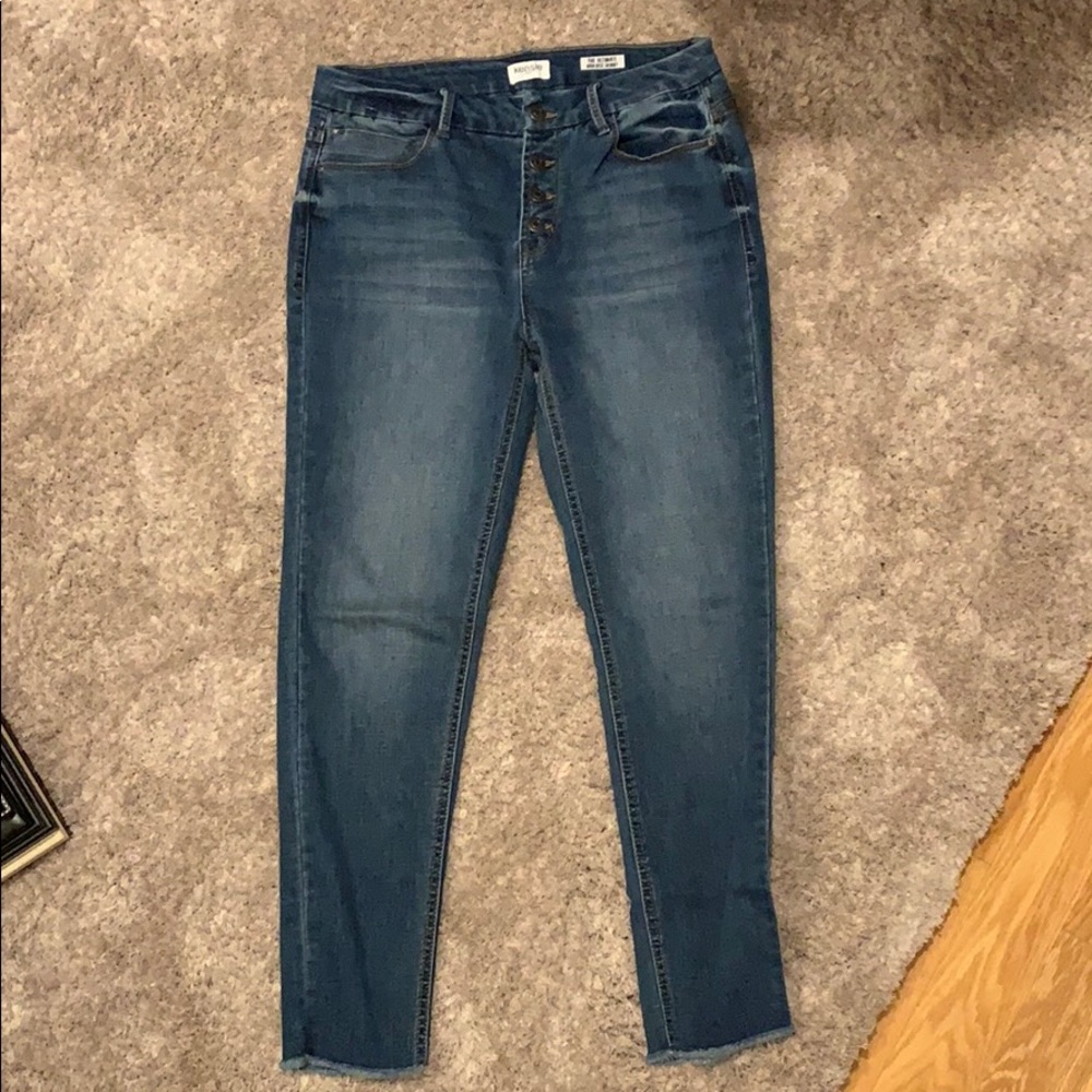 High rise, button fly jeans